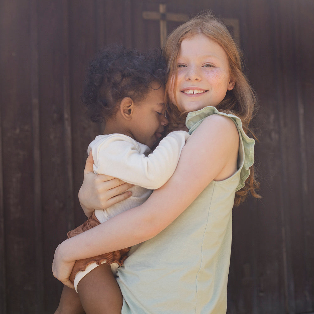 🌿 Top mit Rüschen aus Bio Baumwolle von MINIMALISMA - hellgrün